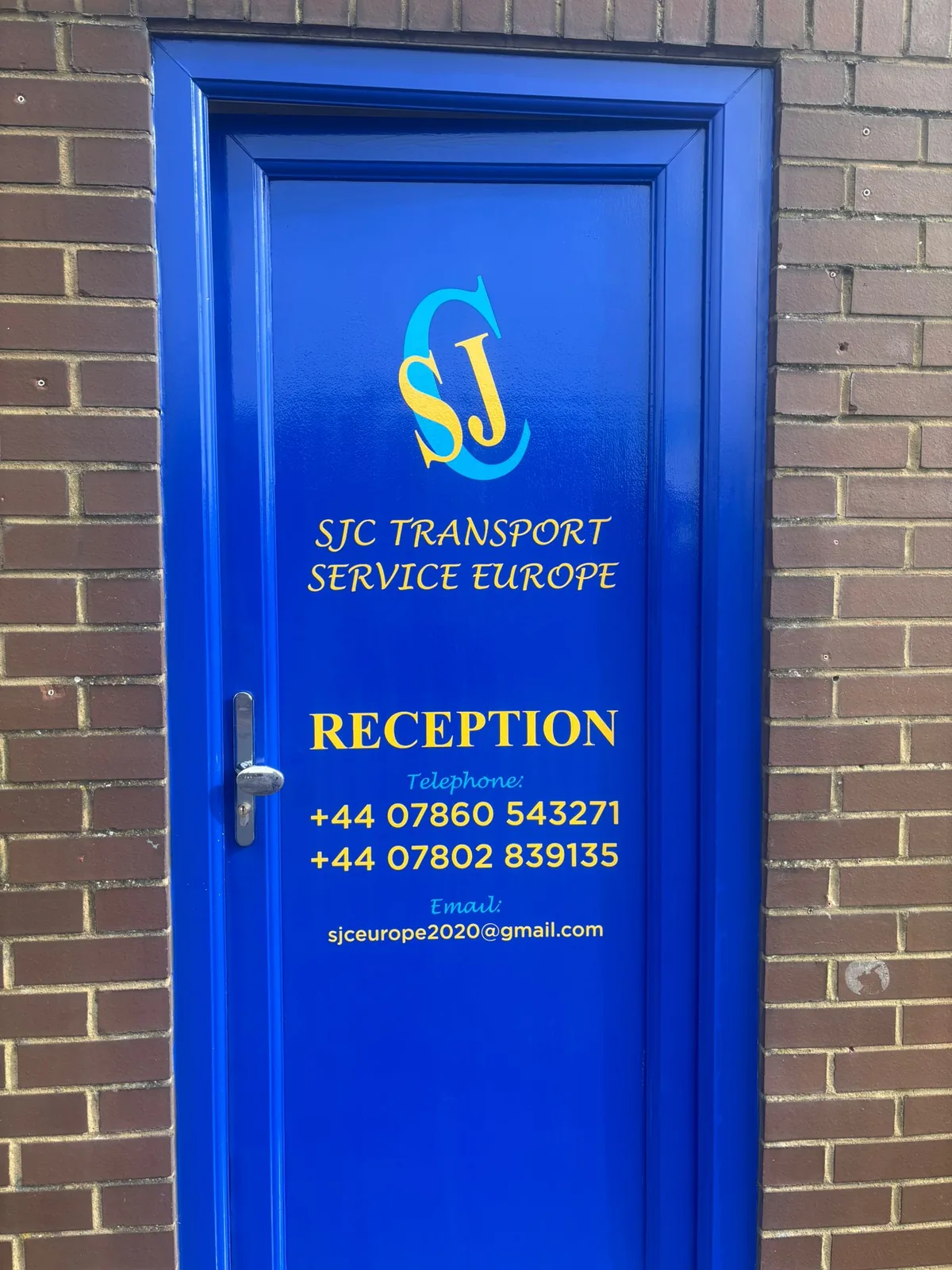 SJC Transport entrance door graphics and vinyl lettering by Talion Graffix